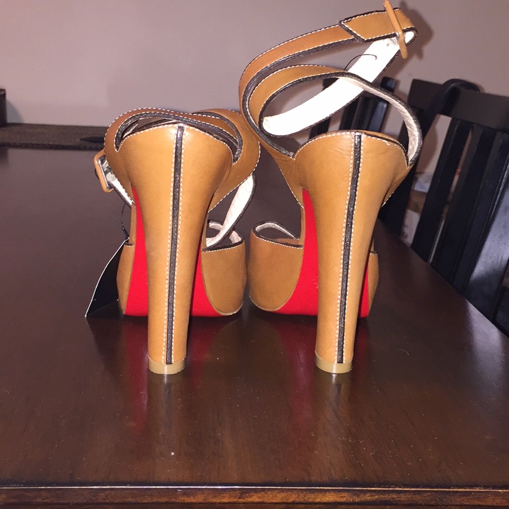 Never worn Louboutin heels